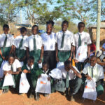 Students posing for a picture in the playground