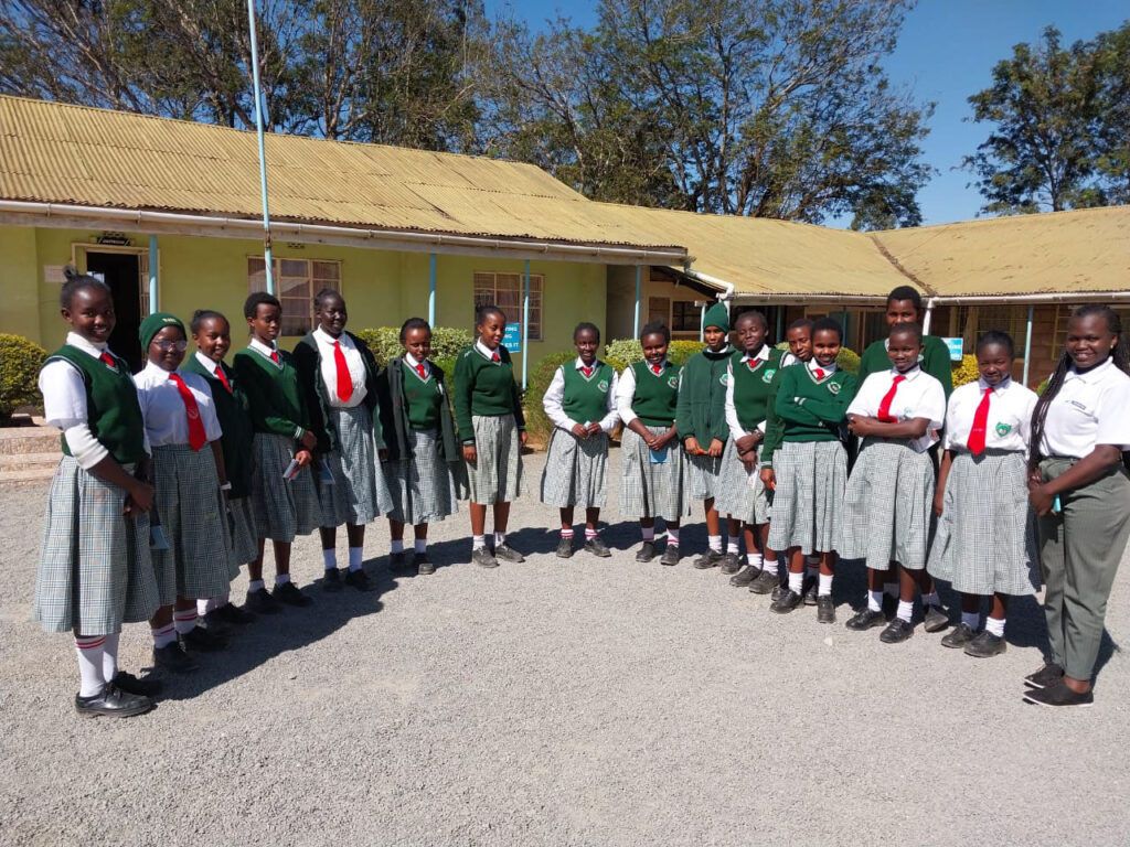 Kenyan School girls standing outside their school